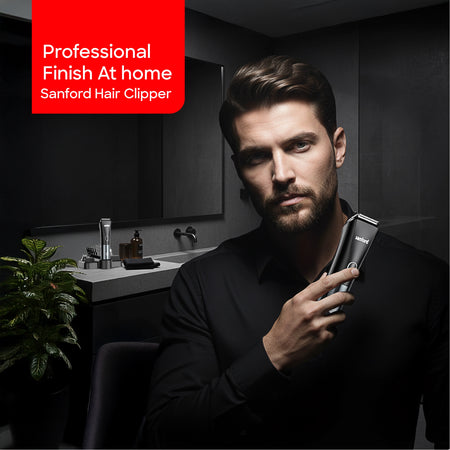 Sanford Rechargeable Hair Clipper 11-In-1 Grooming Kit – lifestyle shot of man in black shirt holding the hair clipper