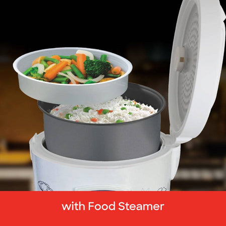 Sanford electric rice cooker complete with measuring cup and rice paddle